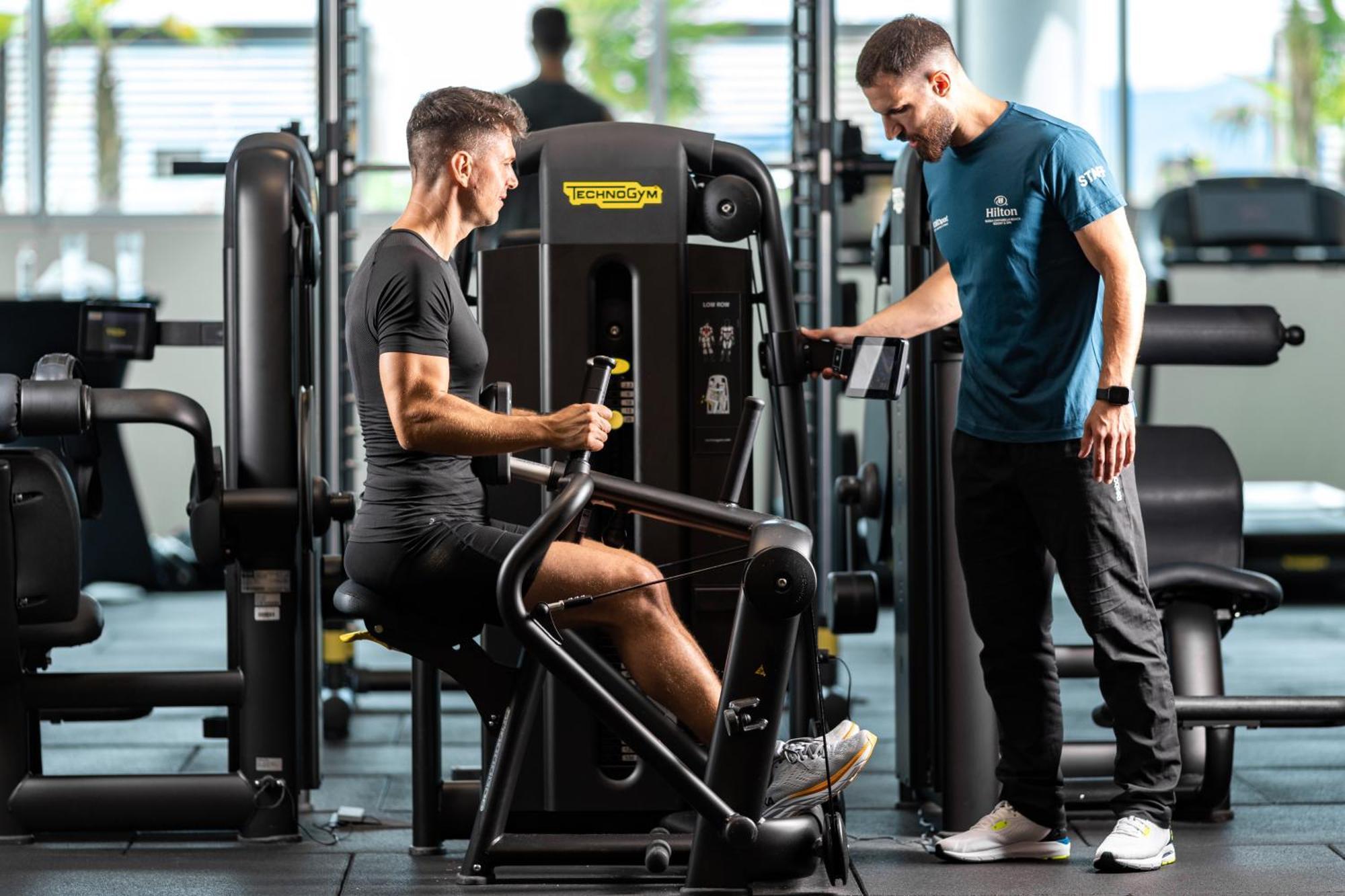 Hilton Rijeka Costabella Beach Resort And Spa Exterior foto Personal trainer with a client