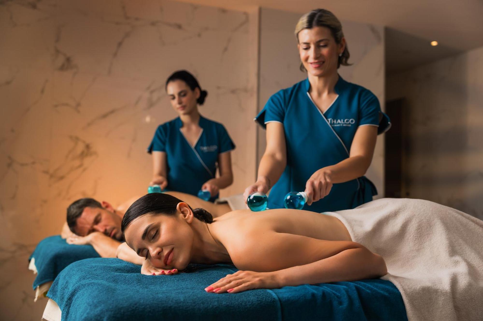 Hilton Rijeka Costabella Beach Resort And Spa Exterior foto A massage therapist performing a massage